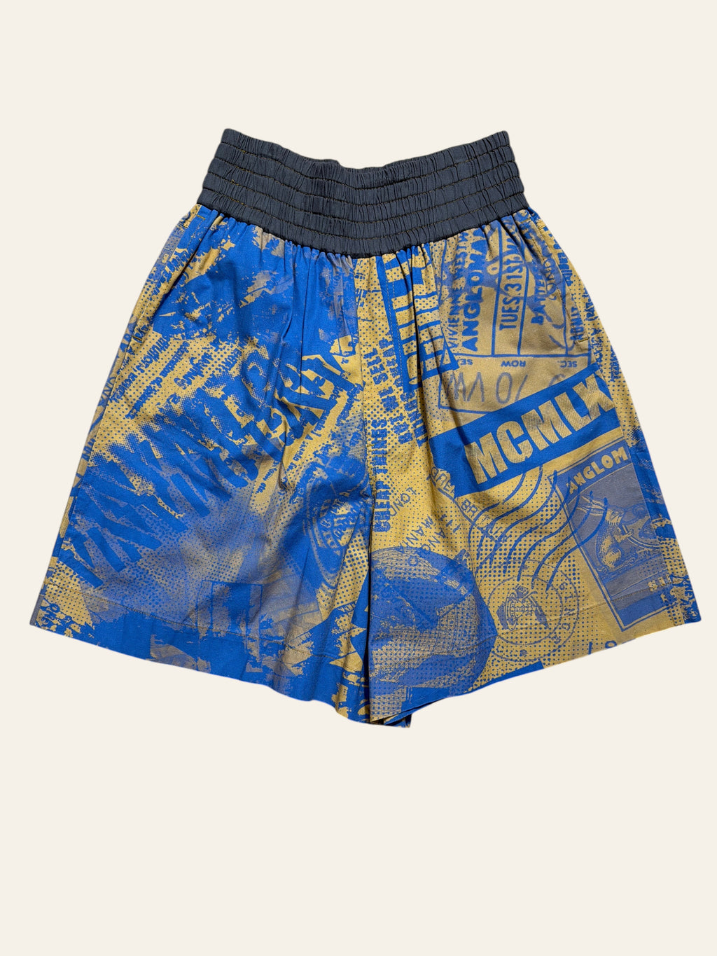 Vivienne Westwood Anglomania blue and yellow graphic print shorts with a wide grey elastic waistband.