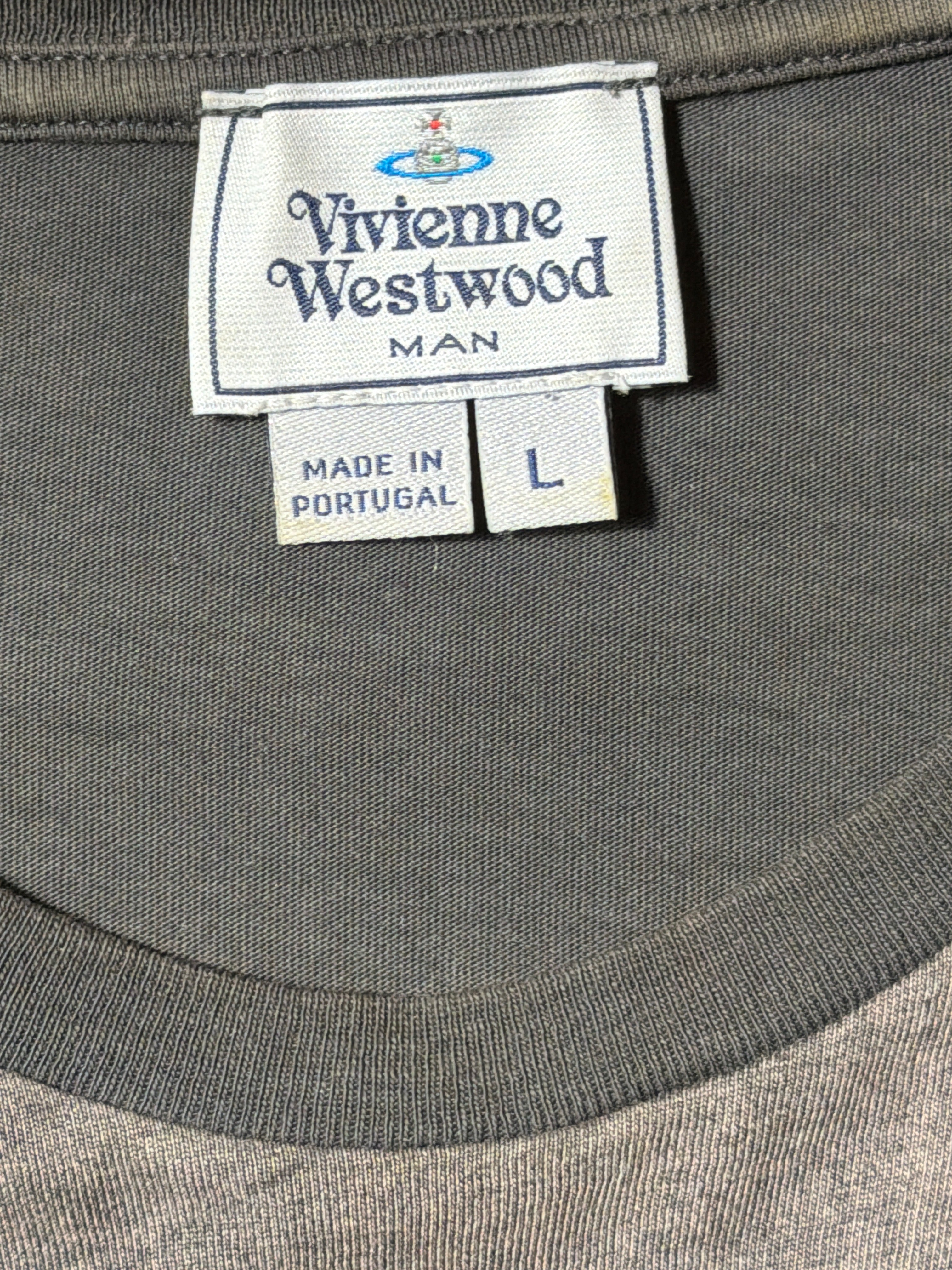 Vivienne Westwood MAN neck label showing size L and Made in Portugal.