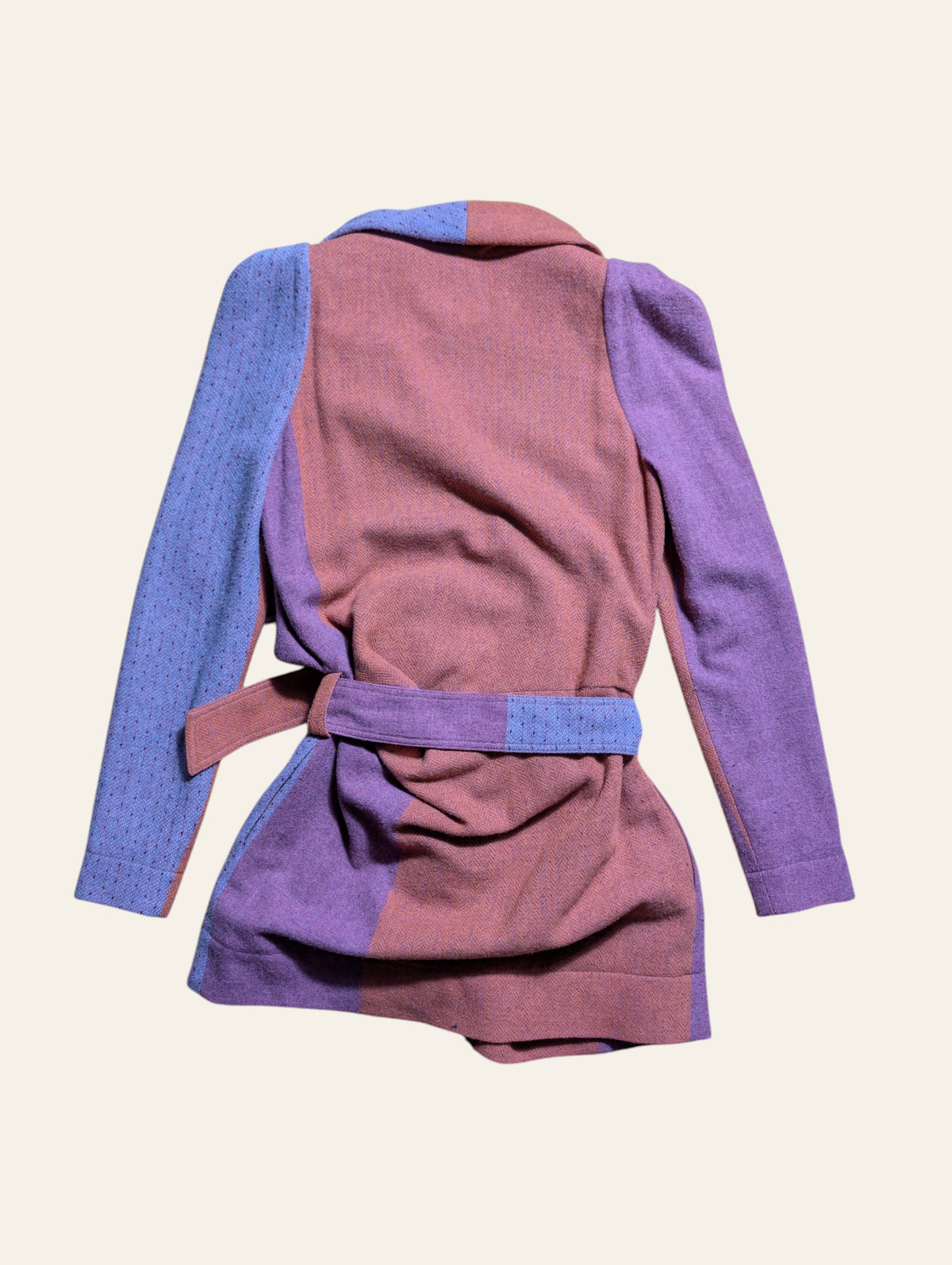 Vivienne Westwood Red Label colour-block belted cardigan with draped collar in pink, rust, and lavender.