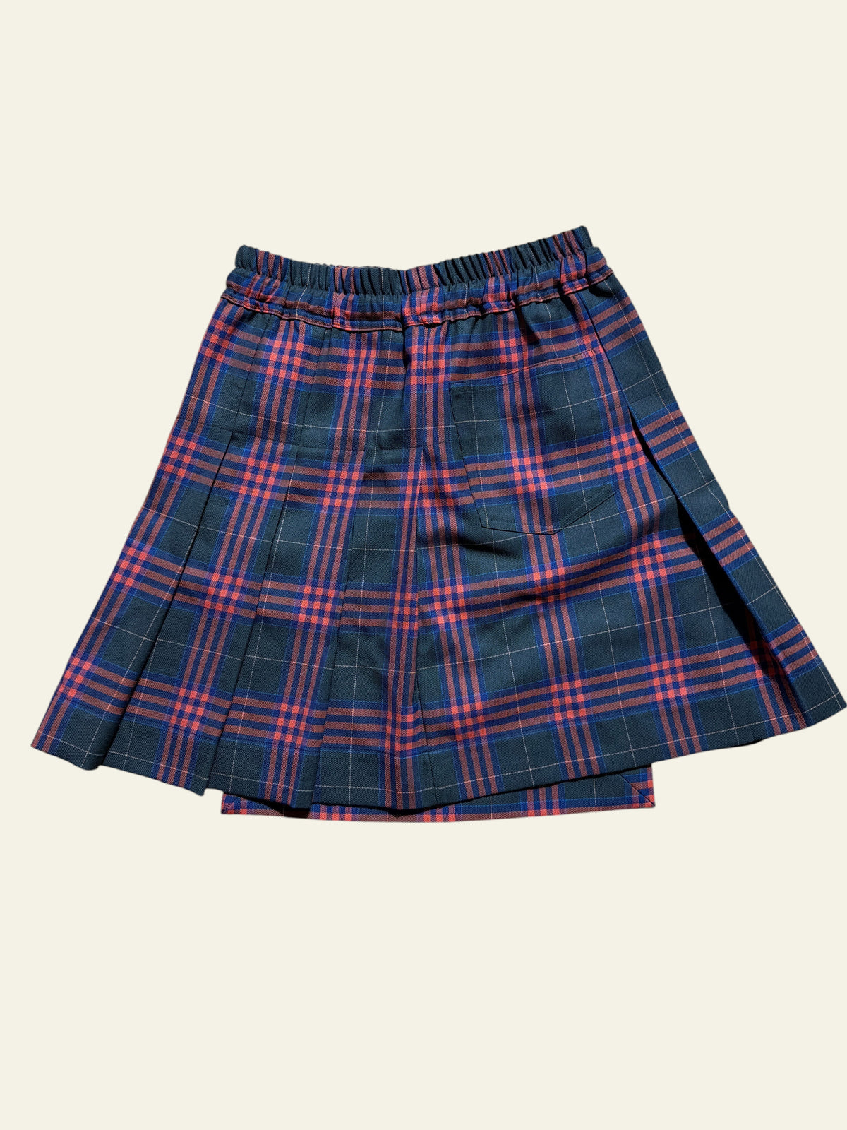 Vivienne Westwood tartan wool pleated skirt with an elastic waistband in red and dark green plaid.